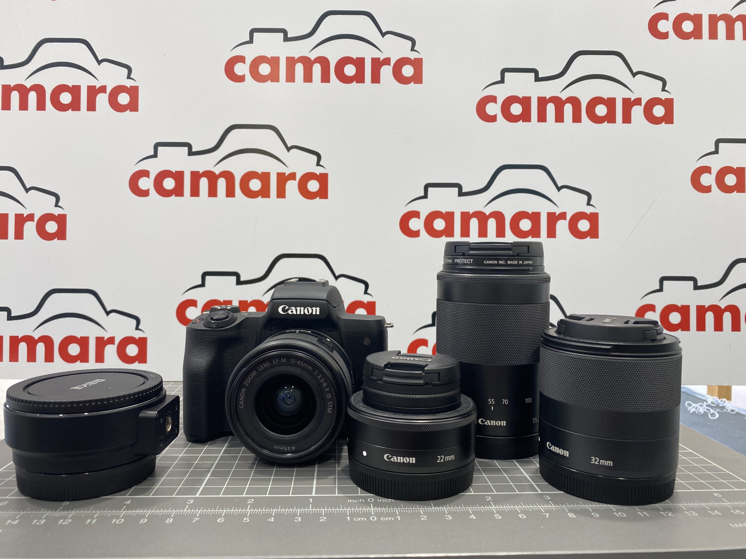 CANON M50 + 15-45 f/3.5-5.6 + 32mm F/1.4 + 22mm F/2 + 55-200 F/4.5-6.3 + Bague d'adaptation EF